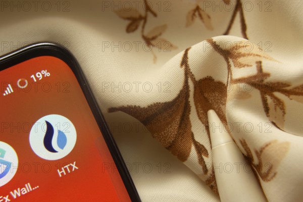 Dhaka, Bangladesh- 07 May 2025: HTX app icon is seen on smartphone