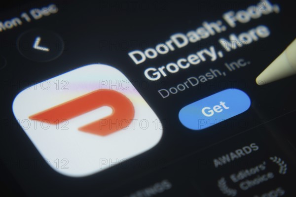 Dhaka, Bangladesh- 01 Dec 2025: A close-up of the DoorDash app icon in the App Store on an iPad screen