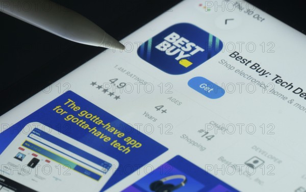 Dhaka, Bangladesh- 30 Oct 2025: Best Buy app on a iPad screen with a pen pointing at the install option