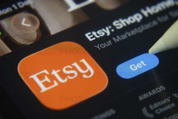 Dhaka, Bangladesh- 01 Dec 2025: A close-up of the Etsy app icon in the App Store on an iPad screen