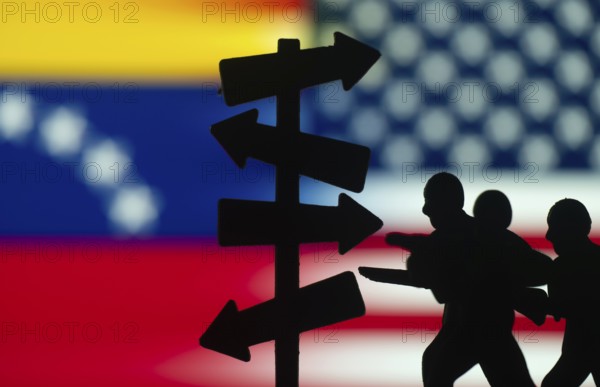 Geopolitical Conflict and Migration Concept with USA and Venezuela Flags