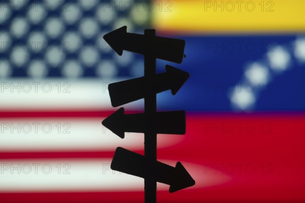 Crossroads of Diplomacy: USA and Venezuela Flag Background with Signpost