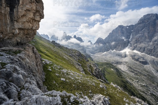 View of picturesque mountain landscape with rocky peaks, Cima Tosa peaks in the back, Via Ferrata SOSAT via ferrata, Brenta Mountains, Trentino, Italy
