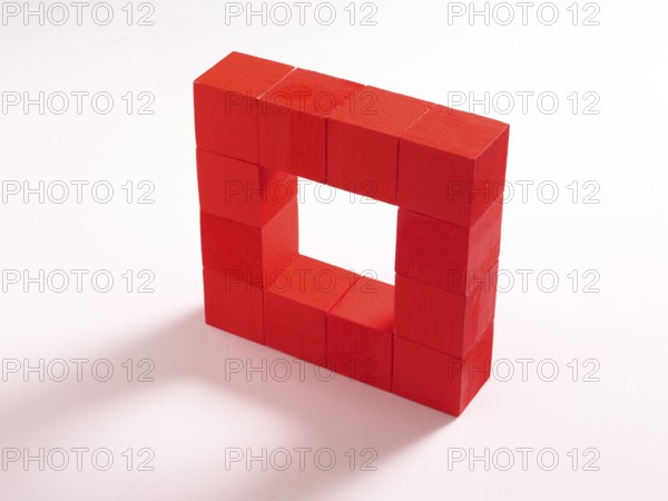 12 red wooden cubes against a white background