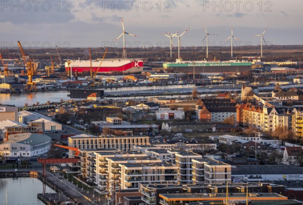 Overview of the overseas port with BLG Auto Terminal in Bremerhaven, Bremen, car transporter Aniara from shipping company Wallenius Wilhemsen, and Niagara Highway from shipping company K-Line, Germany