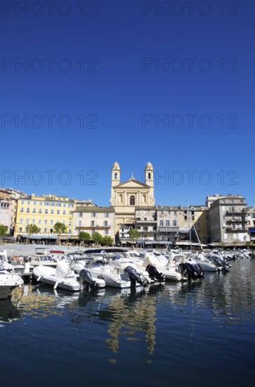 Old port with marina and church of Saint Jean-Baptiste à Bastia or church of St. John the Baptist, Port de Plaisance or Vieux Port, old town, Bastia, Haute-Corse department, Corsica, France