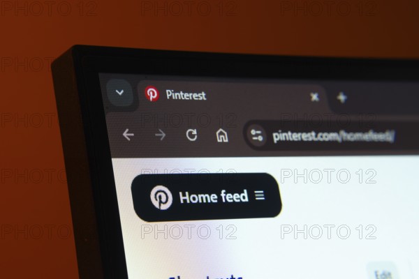 Dhaka, Bangladesh- 02 June 2025: Close-up of a computer screen displaying the Pinterest web interface in dark mode