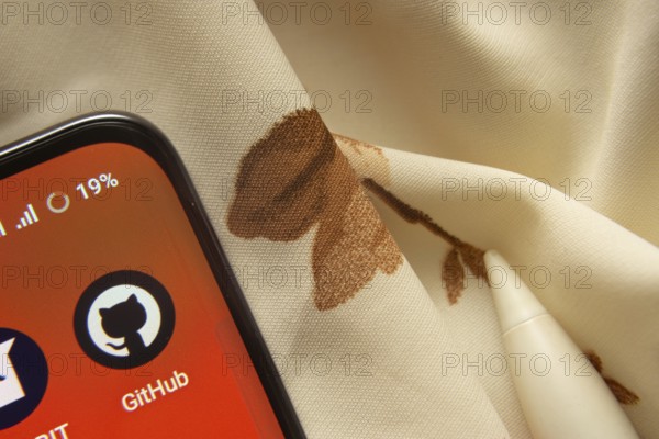 Dhaka, Bangladesh- 07 May 2025: GitHub app icon is seen on smartphone