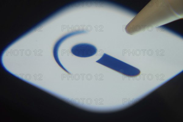 Dhaka, Bangladesh- 06 Dec 2025: Close-up of the Indeed app on a screen with a stylus pointing at it