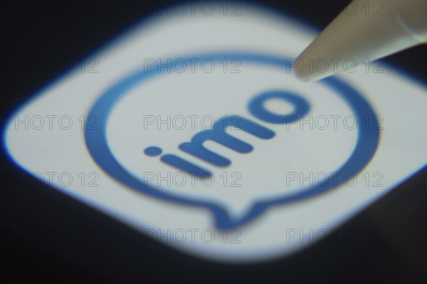 Dhaka, Bangladesh- 06 Dec 2025: Close-up of the imo app on a screen with a stylus pointing at it
