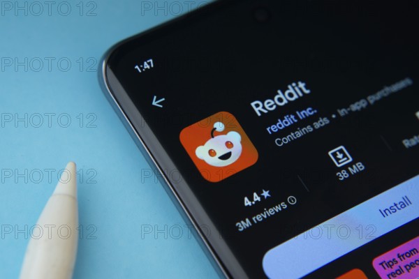Dhaka, Bangladesh- 09 Mar 2025: Reddit app from Google Playstore is displayed on a smartphone screen
