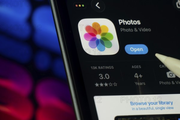 Dhaka, Bangladesh- 24 Oct 2025: A iPad screen displaying the Apple Photos app on App store