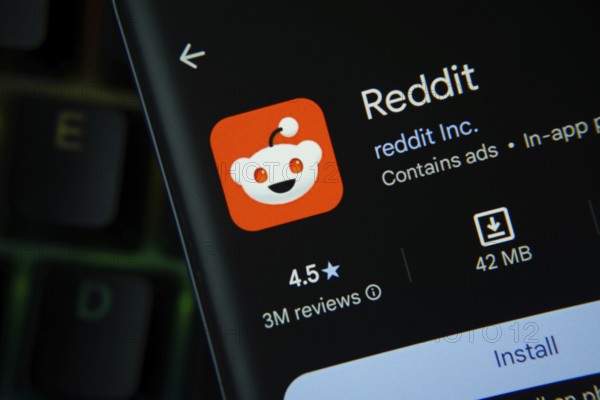 Dhaka, Bangladesh- 27 July 2025: Reddit app from Google Playstore is displayed on a smartphone screen