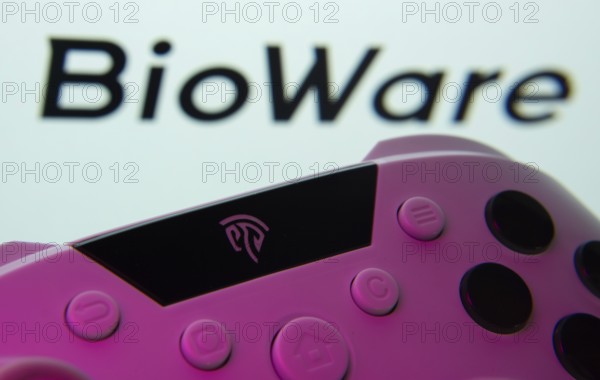 Dhaka, Bangladesh- 24 Mar 2025: A close-up of a gamepad with the BioWare seen on screen in the background
