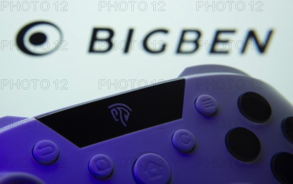 Dhaka, Bangladesh- 24 Mar 2025: A close-up of a gamepad with the Bigben seen on screen in the background