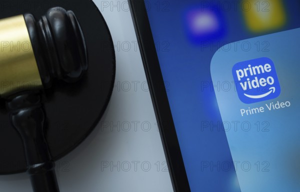 Dhaka, Bangladesh- 05 March 2025: A close up of an iPad screen displaying the Amazon Prime Video app alongside a judge's gavel