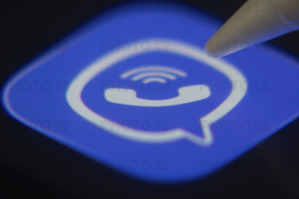 Dhaka, Bangladesh- 06 Dec 2025: Close-up of the Rakuten Viber app on a screen with a stylus pointing at it