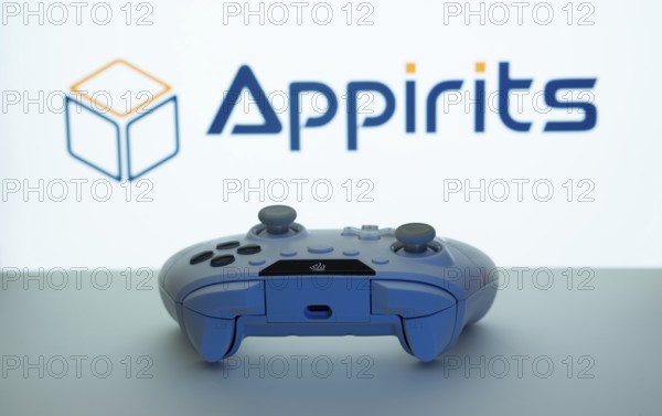 Dhaka, Bangladesh- 08 Apr 2025: A gaming controller in front of a Appirits screen