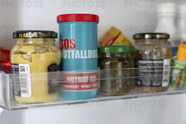 Emergency box in a refrigerator, it contains a comprehensive information sheet which gives emergency services medical information about the patient in an emergency, refrigerator is available in every household, central point for rescuers to receive information about the patient in an emergency, a sticker on the refrigerator door and front door indicates the emergency box