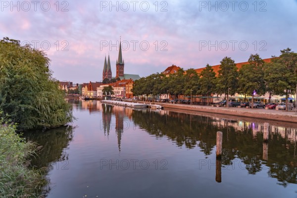Old town with St. Mary's Church and St. Peter's Church and the Trave at dusk, Lübeck, Schleswig-Holstein, Germany