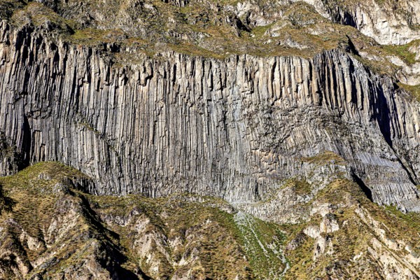 Detailed view of impressive geological formations on a rock wall, the landscape of the Colca Canyon in the Aden of Peru