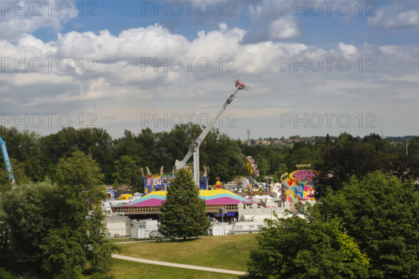 No limit carousel, fairground in Friedrichsau Ulm, folk festival, hustle and bustle, fair, amusement park, amusement attraction, ride, blue sky, clouds, Ulm, Baden-Württemberg, Germany