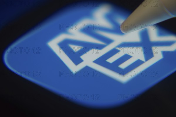 Dhaka, Bangladesh- 06 Dec 2025: Close-up of the Amex app on a screen with a stylus pointing at it