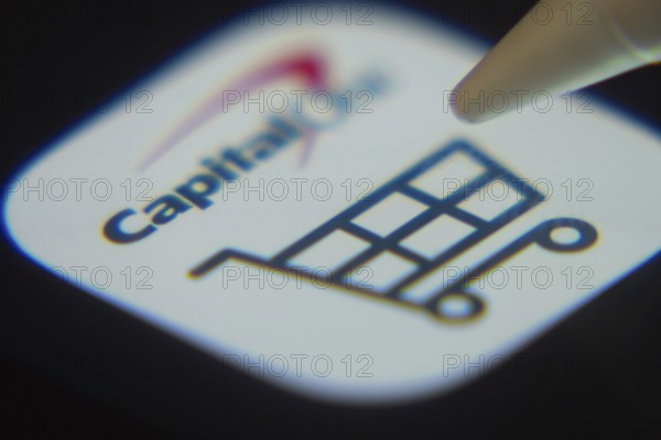 Dhaka, Bangladesh- 06 Dec 2025: Close-up of the Capital One app on a screen with a stylus pointing at it