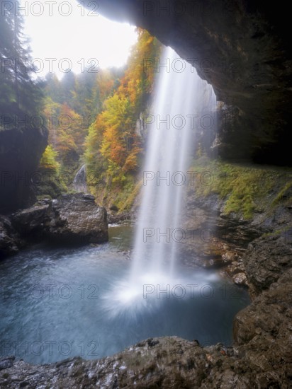 Waterfall mountain list in autumn-colored surroundings, Linthal, Klausenpass, Canton of Glarus, Switzerland