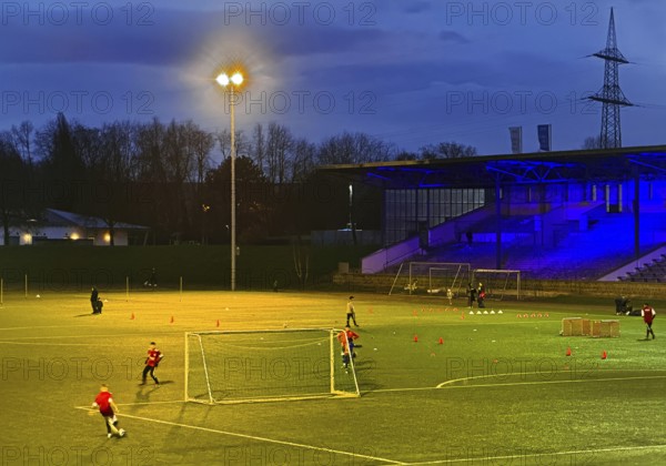 Youth training in the royal blue Glückauf Kampfbahn of FC Schalke 04, Gelsenkirchen, Ruhr area, North Rhine-Westphalia, Germany