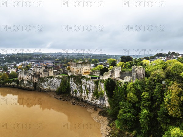 Autumn over Chepstow Castle and River Wye from a drone, Chepstow, Monmouthshire, Wales, UK