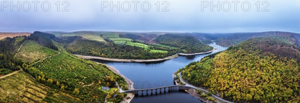 Autumn over Garreg Ddu Dam from a drone, Elan Valley, Caban-Coch Reservoir, Rhayader, Wales, UK