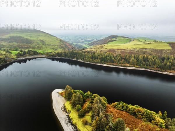Autumn colours over Llyn Clywedog and Clywedog Reservoir from a drone, Llanidloes, Wales, UK