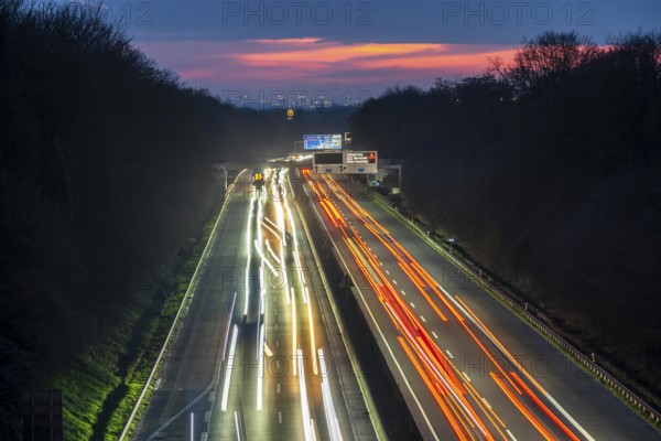 Evening traffic on the A52 motorway, between Düsseldorf and Essen, in front of the Breitscheid motorway junction, partly slow rush hour traffic, looking south, North Rhine-Westphalia, Germany