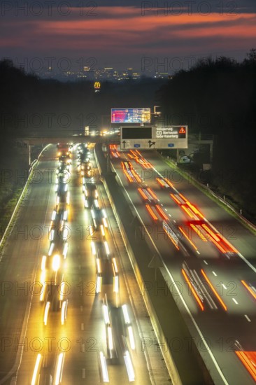 Evening traffic on the A52 motorway, between Düsseldorf and Essen, in front of the Breitscheid motorway junction, partly slow rush hour traffic, looking south, North Rhine-Westphalia, Germany