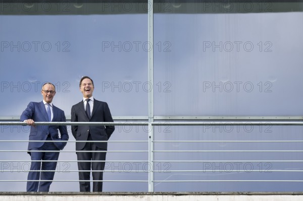 Friedrich Merz (Chancellor of the Federal Republic of Germany, CDU) and Mark Rutte (Secretary General of NATO) wave from the terrace in front of a joint one-on-one meeting at the Federal Chancellery, Berlin, 11 December 2025