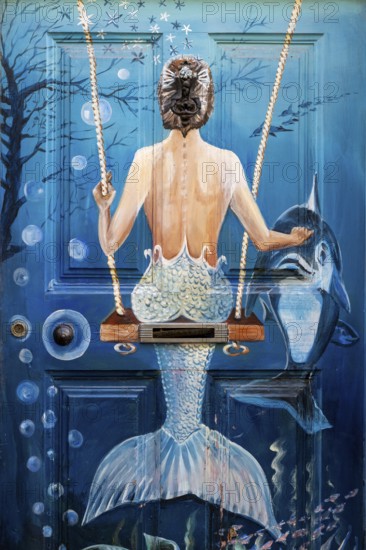 Colourfully painted doors on Santa Maria Street in the old town, Funchal, Madeira, Portugal