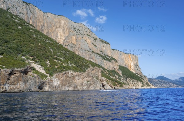 Picturesque rocky coast, cliffs and blue sea, Golfo di Orosei, Baunei, Sardinia, Italy