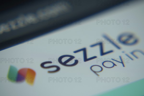 Dhaka, Bangladesh- 02 Dec 2025: A Close-up of a laptop screen is displaying the Sezzle web interface in a browser