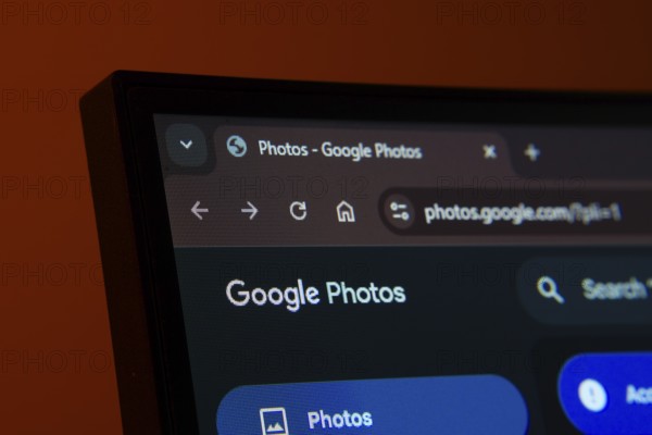 Dhaka, Bangladesh- 02 June 2025: Close-up of a computer screen displaying the Google Photos web interface in dark mode