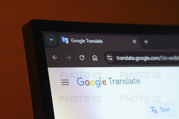 Dhaka, Bangladesh- 02 June 2025: Close-up of a computer screen displaying the Google Translate web interface in dark mode
