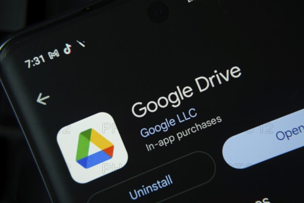 Dhaka, Bangladesh- 27 July 2025: Screen displaying Google Drive app with open and uninstall options, dark interface