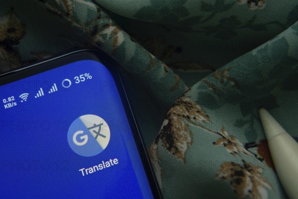 Dhaka, Bangladesh- 07 May 2025: Google Translate app icon is seen on smartphone