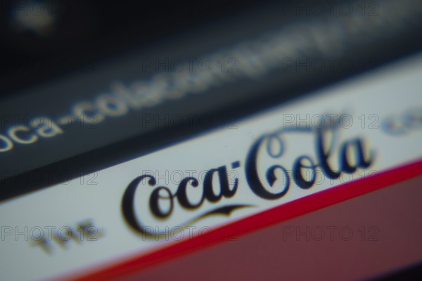 Dhaka, Bangladesh- 02 Dec 2025: A Close-up of a laptop screen is displaying the The Coca-Cola Company web interface in a browser