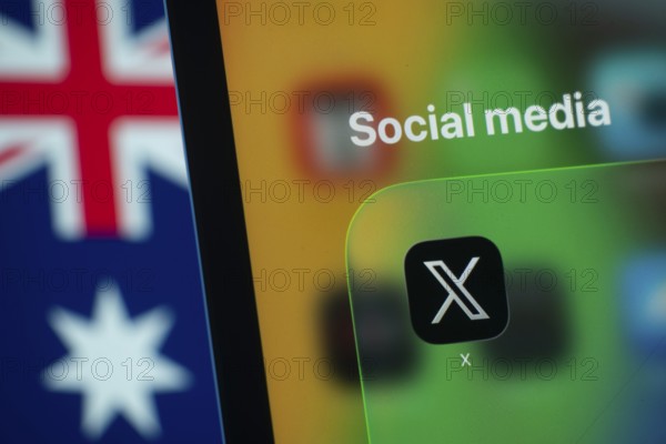 Dhaka, Bangladesh- 01 Dec 2025: A smartphone screen displays the X app with an Australian flag in the background
