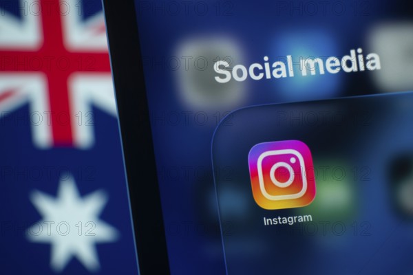 Dhaka, Bangladesh- 01 Dec 2025: A smartphone screen displays the Instagram app with an Australian flag in the background