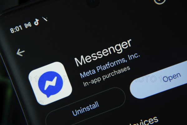 Dhaka, Bangladesh- 27 July 2025: Screen displaying Facebook Messenger app with open and uninstall options, dark interface