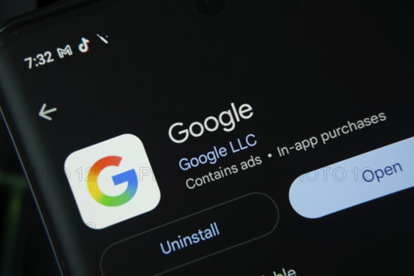 Dhaka, Bangladesh- 27 July 2025: Screen displaying Google app with open and uninstall options, dark interface