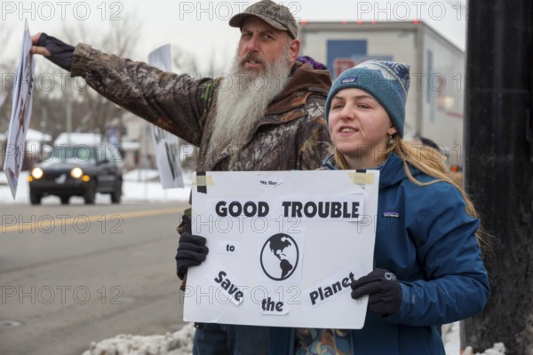 Saline, Michigan USA - 1 December 2025 - Rural Michigan residents rally against the $7 billion Stargate data center planned on southeast Michigan farm land. Protesters say the Data Center is being fast tracked by DTE Energy, the large electric utility, and that it could raise residential electricity rates and endanger the water supply