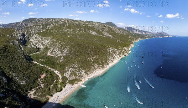 Picturesque rocky coast, cliffs and Cala Luna beach, aerial view, Golfo di Orosei, Baunei, Sardinia, Italy